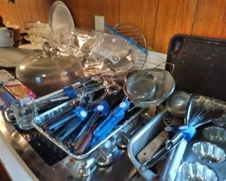 Silver ware and stainless flat ware and lots of kitchen gadgets