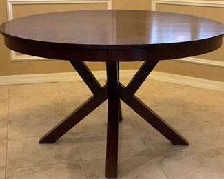 Contemporary Dark Wood Dining Table w/ 4 Chairs	Table: 30.5in H x 51 in Diameter.   Chairs: 39x18x19in seat height : 19.5in H	HxWxD
