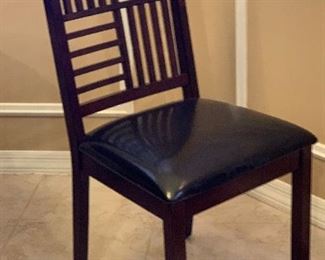 Contemporary Dark Wood Dining Table w/ 4 Chairs	Table: 30.5in H x 51 in Diameter.   Chairs: 39x18x19in seat height : 19.5in H	HxWxD
