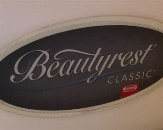 Queen Tufted Leather/Dark Wood Bed w/  Simmons Beautyrest Mattress	27x64x87in	HxWxD
