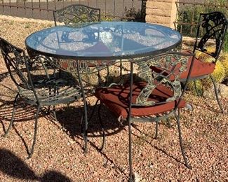 5pc Wrought Iron Vintage Patio Set Table & 4 Chairs	29in H x 48in Diameter	

