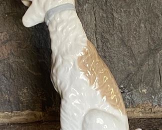 NAO by Lladro 0251 "Dog Yawning" curly haired puppy dog yawning/laughing		