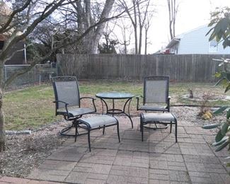 Deck Furniture- 2 Swival Chaurs, 2 ottomans  & Table