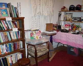 books, bookcase, chair, office misc. helmets, art supplies