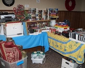 rugs, wall décor, VHS, DVD, puzzles, games, foot machine, electronics
