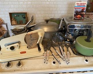 129) Silva King Slicer $15, Set of Utensils (8) $8, Ask on Cookware..its not in great shape.