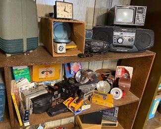 272) LOT OF ENTIRE MIDDLE SHELF..Cameras, Lights, Film, Books,  ALL..$40