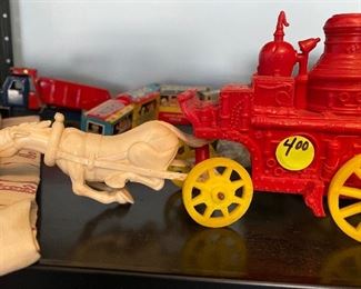 33) Plastic Fire Truck Horse $4