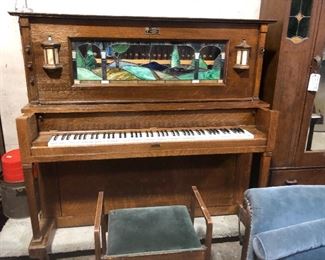 1919 Player piano, beautiful with stain glass and built in light sconces... lots of music rolls too!