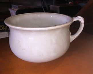 "A pot to pi#* in" AKA a turn of the century chamber pot.