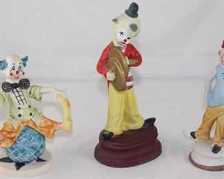 Clown Figurines: Depose Italy “On Top of the World “ (5.5”), Clown with Cymbals Bisque Porcelain and McCrory Corp Bisque Clown with Umbrella.