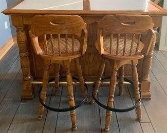 stand alone bar with two stools, storage in back