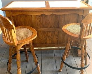 stand alone bar with two stools, storage in back