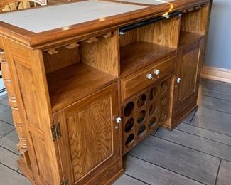 stand alone bar with two stools, storage in back