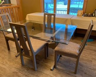 dining room glass top trestle table with chairs