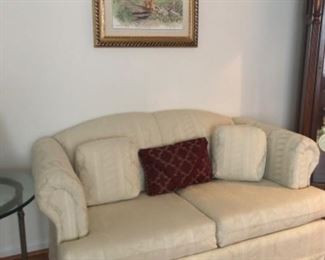 Matching Broyhill cream loveseat with rolled arms. 