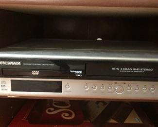 Sylvania CD/DVD player with VCR. 