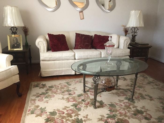 Beautiful  Broyhill cream sofa, loveseat, wing chairs  and floral area rug.  (Mirrors not available)
