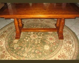 Sturdy Table and Round Area Rug