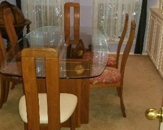 Benny Linden table and 6 chairs. Great look, very functional and the chairs are Comfortable !!