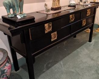 Black Lacquered console/buffet. Mid Century Measures 72" by 31"