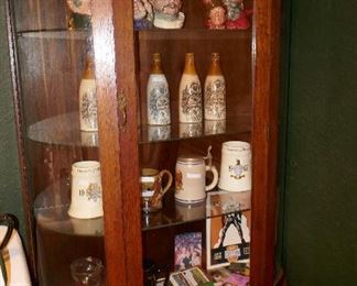 Curved Glass China Cabinet w/ Steins and collectibles