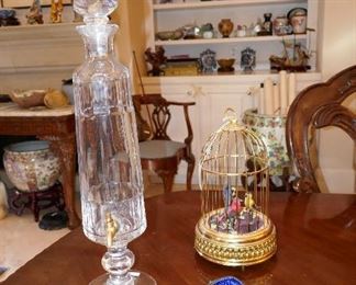 Fine Crystal Decanter and Musical Birds in Cage