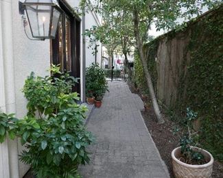 Garden full of pots and furniture