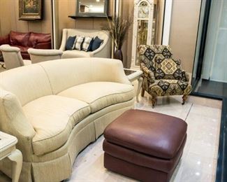 This rounded sofa in our front window is very nice! Approximately 76" wide.