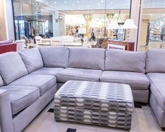 Large gray sectional and ottoman! Has a chaise on the end that is not shown.