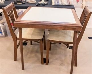 Stakmore card table and two chairs.