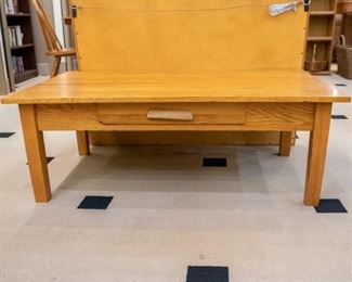 Oak coffee table with drawer.