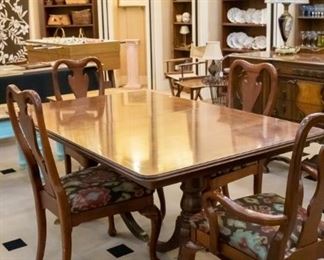 Antique table (and leaf), four chairs.