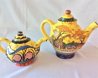 Hand Painted Teapots, Penzo, Zimbabwe. 9" H for tallest (reverse).  