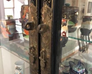 Asian China / Display cabinet. Measures 39 1/4 inches across 67 and three-quarter inches tall and 16 1/2 inches deep.