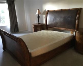 Queen size Haverty’s bed and two night chests with mattress