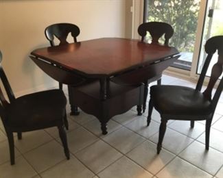 Haverty’s dinette - drop leaf at each side - with 4 chairs. 