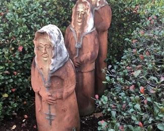 Three terra-cotta monks