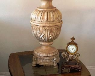 Side table and one of a pair of lamps