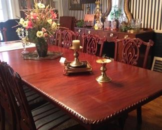 This gorgeous dining table will comfortably seat 12 or more.