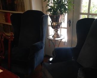 Pale blue pair of wingback chairs; brass plant stand