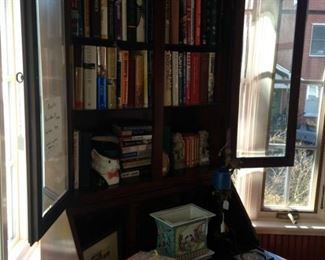 Antique secretary with desk, display, and storage areas