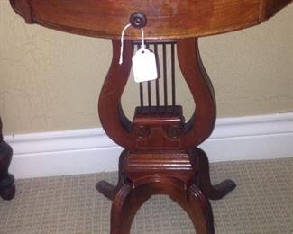 Antique lyre base drum table 