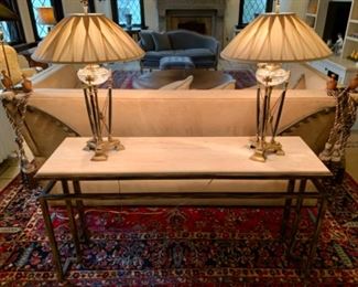 Contemporary, natural stone top console table.