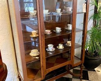 Antique china cabinet. Measures 62"h x 44"w x 17"d.