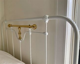 Full size iron bed.