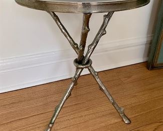 Global Views black granite and nickel finish side table. We love this!