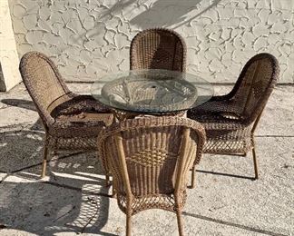 Glass top table with 4 chairs.