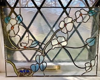 Leaded glass with bird nest.