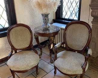 His and Her Chairs. Nicely reupholstered and quite comfortable!